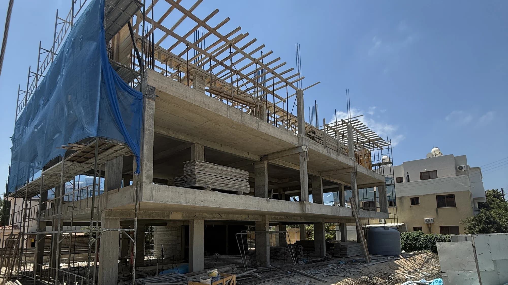 Michelle Park under construction: the concrete frame in scaffolding, rebar and formwork on site